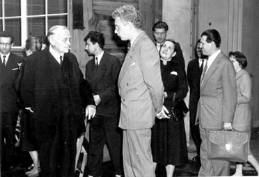 A 1962 photograph taken prior to or following ceremony granting Professor Jan Czekanowski an honorary doctorate from the University of Wrocław. In the foreground, from left to right, stand Jan Czekanowski and Tadeusz Bielicki. Behind them on the right are Tadeusz Dzierżykray-Rogalski and Wanda Stęślicka-Mydlarska.