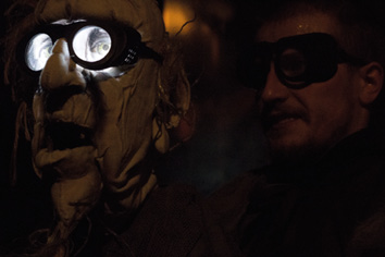 A man wearing a mask and glasses.